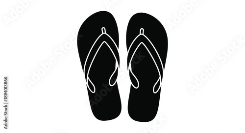 A pair of black flip flops are displayed against a stark white background creating a striking silhouette high quality professional detailed