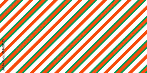 Christmas seamless pattern. Red and green diagonal stripes background. Candy cane repeating decoration wallpaper. Winter holiday lines backdrop. vector