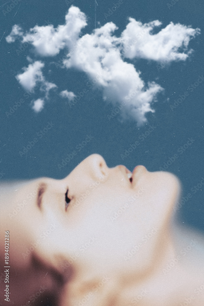 Fototapeta premium Woman's profile looking up at a cloud, visualizing peace and imagination