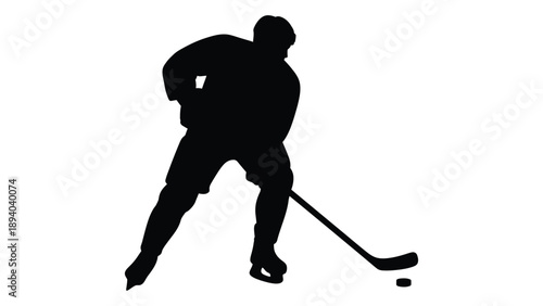 A black silhouette of a hockey player skating with a stick and puck