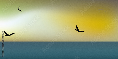 The sea eagles.Golden India. Kites circling gracefully in sunset under Golden Indian sky, Indian ocean. Tropical sunset and quiet surface of sea