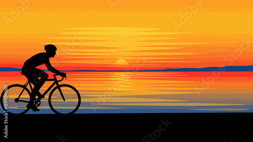 Cyclist silhouette at sunset by the sea with vibrant horizon