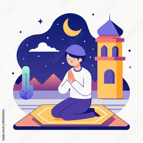 Young Muslim boy praying at night near mosque