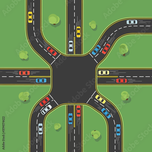 Busy traffic intersection with cars moving on road network, aerial view