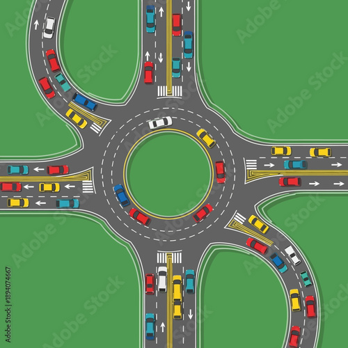 Busy traffic roundabout intersection with cars and trucks in motion, aerial view