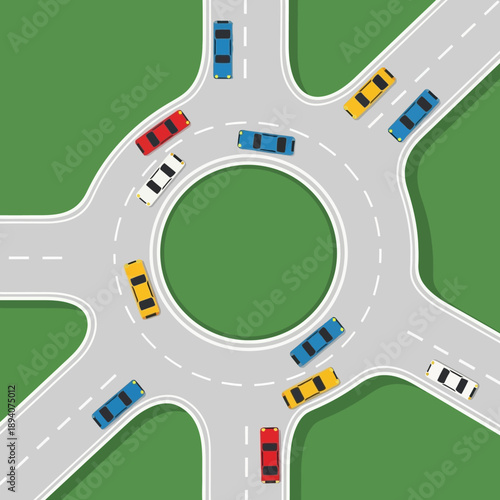 Aerial View of Busy Roundabout with Cars and Green Grass Background