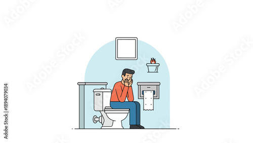 Frustrated man sits on a white toilet in a blue bathroom while holding his head with both hands due to stress or pain.