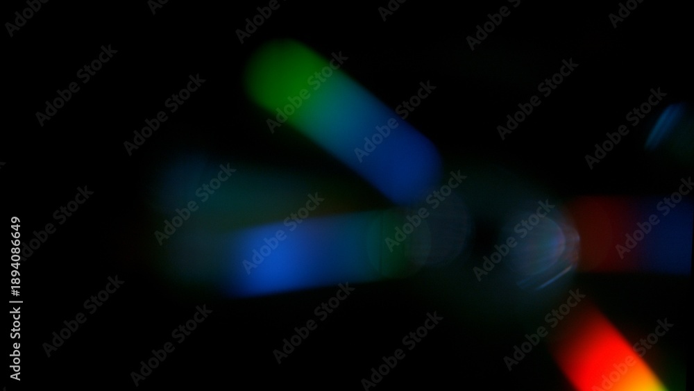 Fototapeta premium Real Lens Flare Reflections for Overlay or Transition Isolated on Black