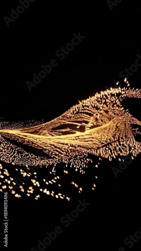 Luminous golden particles flowing and twisting in an elegant, abstract stream. Shiny dust creating a mesmerizing, dynamic wave motion