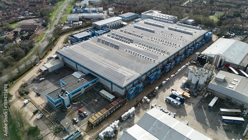 Aerial view of the expansive Colt Data Centre services, a symphony of steel and concrete under a muted winter sky, Welwyn Garden City, United Kingdom.
