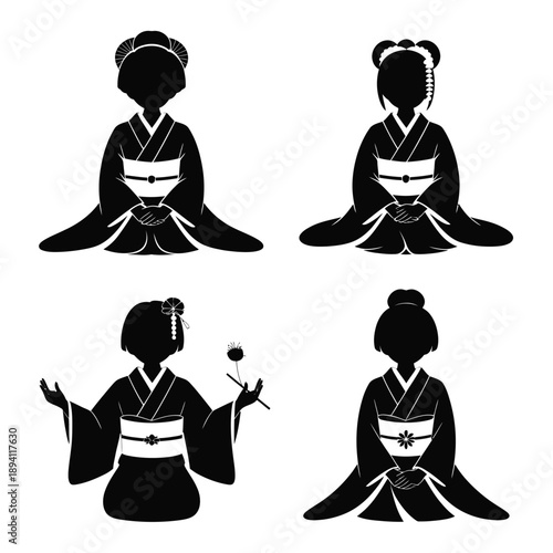 Four black and white geisha in traditional kimonos