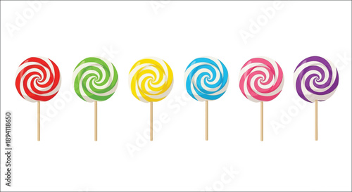 A row of colorful swirling lollipops on wooden sticks