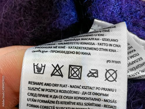 Fotografie Close up of the care label with washing symbols icons