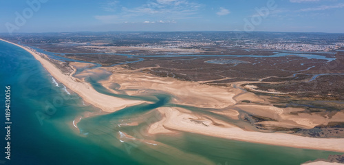 This aerial view captures Ria Formosa and Praia de Faro in Portugal