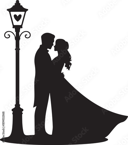 A romantic silhouette of a loving couple embracing under an old fashioned street lamp with a heart