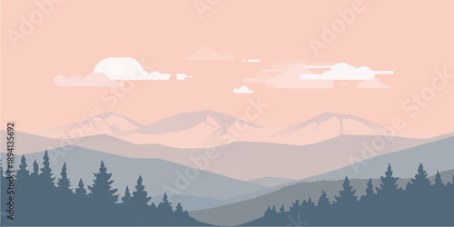 Foggy winter mountains at sunrise over a quiet forested valley