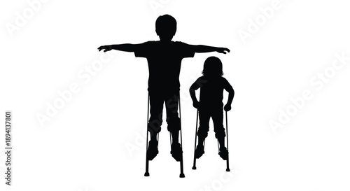 Children with stilts in a dark striking silhouette
