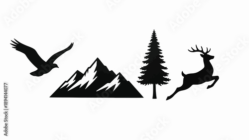 Mountain landscape with wildlife in stark black silhouette