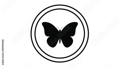 A delicate butterfly design within a circular frame a striking silhouette