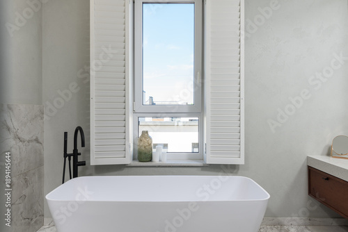 Calm Spainspired Bathing Area, Homeowner Enjoys Tranquil Evening Bath In Elegant Surroundings