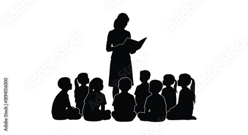 Teacher reading to students in a classroom stark silhouette