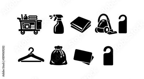 Hotel cleaning icons set featuring cart, vacuum, and do not disturb sign