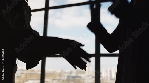 Emotional couple arguing and gesturing hands during relationship crisis