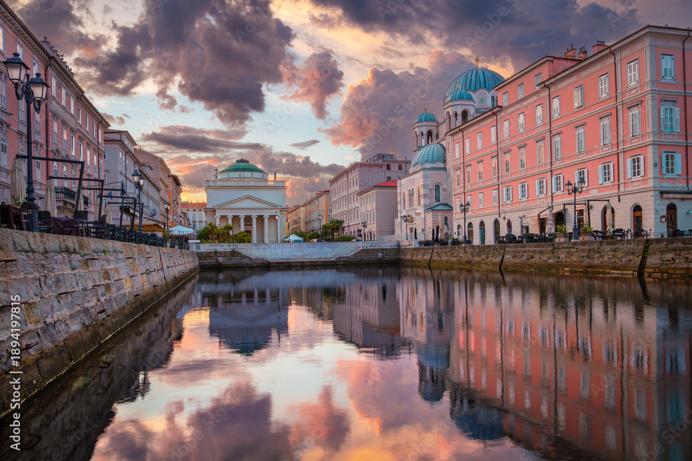 Fototapeta premium Trieste, Italy. Cityscape image of downtown Trieste, Italy with the Sant' Antonio Taumaturgo church at summer sunrise.