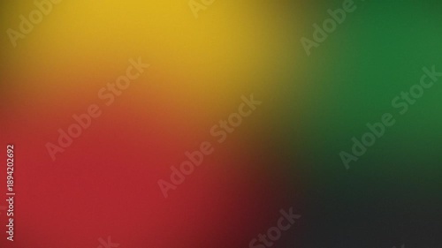 Gradient with red, gold, and green blur across a dark backdrop. Black history month colors background