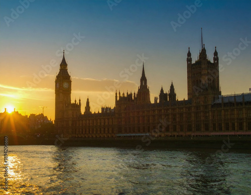 Stunning sunset silhouette of the iconic parliament and clock tower over the River Thames. A powerful metaphor for history and governance, ideal for editorial, travel, and heritage projects.