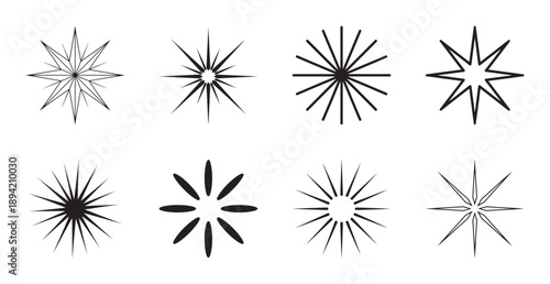 A set of eight abstract starburst and sparkle vector icons in black and white