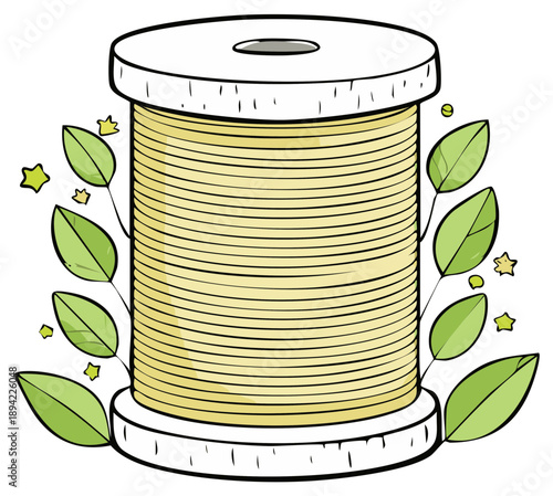 Spool of yellow thread with green leaves and small stars decoration