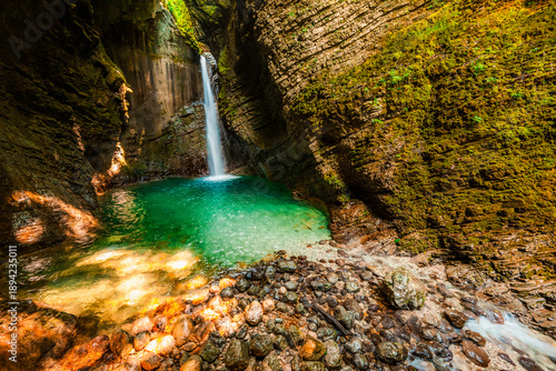 Tableau sur toile Kozjak waterfall in Slovenian alps near soca river