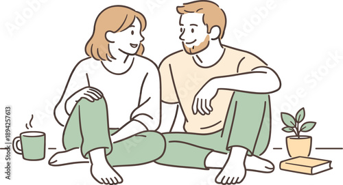 Partners enjoying quiet time together, seated comfortably side by side with soft conversation and unhurried