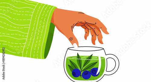A hand reaching for a cup of green tea with blueberries and mint leaves, viewed from the side