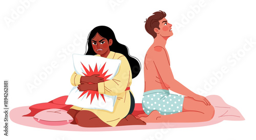 Couple sitting together on a blanket, one holding a picture, outdoors in a relaxed setting, viewed from behind