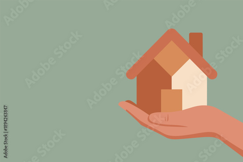 Hand Holding a Small House, real estate ownership concept with copy space