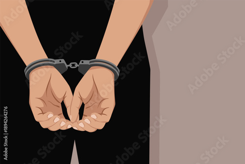 Hands in Handcuffs Behind Back, law enforcement concept with copy space