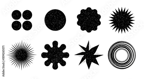 A collection of nine black abstract shapes displayed against a white background from a direct viewpoint