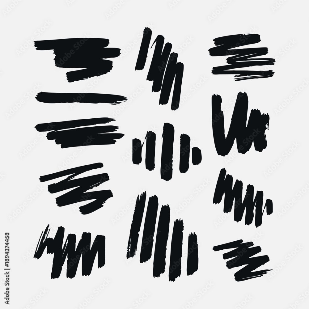 Obraz premium Collection of black hand drawn brush strokes and ink textures isolated on white background for artistic design elements