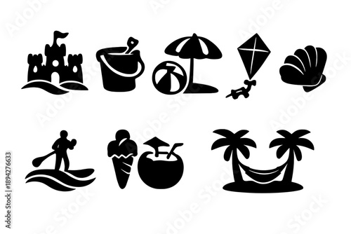 Seaside Fun Icons. Solid style icons of Seaside Entertainment: sandcastle bucket, beach ball umbrella, kite shell, paddleboard
