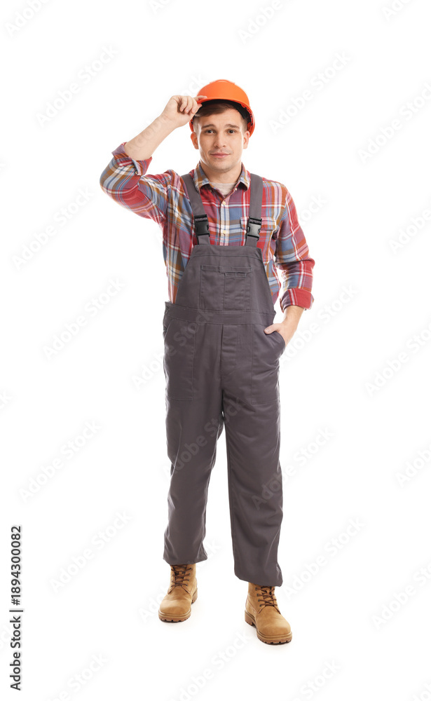 Naklejka premium Professional builder wearing hardhat on white background