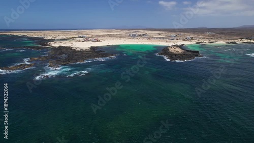 Aerial view of Playa De La Concha, El Cotillo, Fuerteventura, Canary islands, Spain. 2x speeded up from 30 fps.