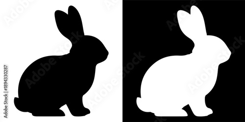 Black and white silhouette of a rabbit.