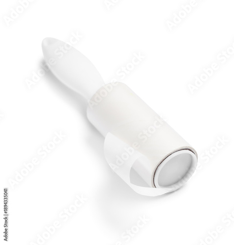 Sticky lint roller on white...