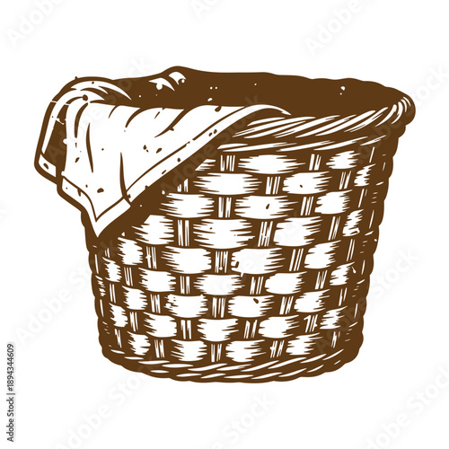 Vintage Grunge texture A brown wicker laundry basket with a towel draped over the side on white background