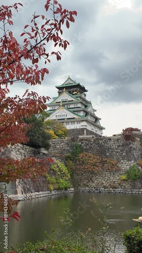 Osaka Castle Surrounded by Moat and Autumn Foliage