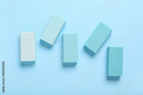 Blue rubber erasers on colo...