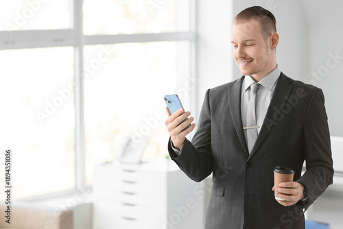 Handsome businessman with c...