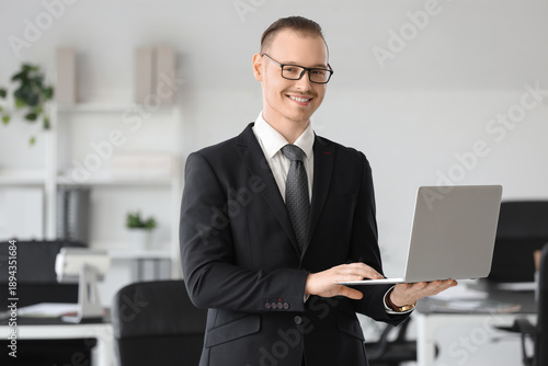 Handsome businessman in eye...
